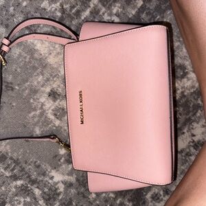 Michael Kors Pink Crossbody Bag with Minimalist Design